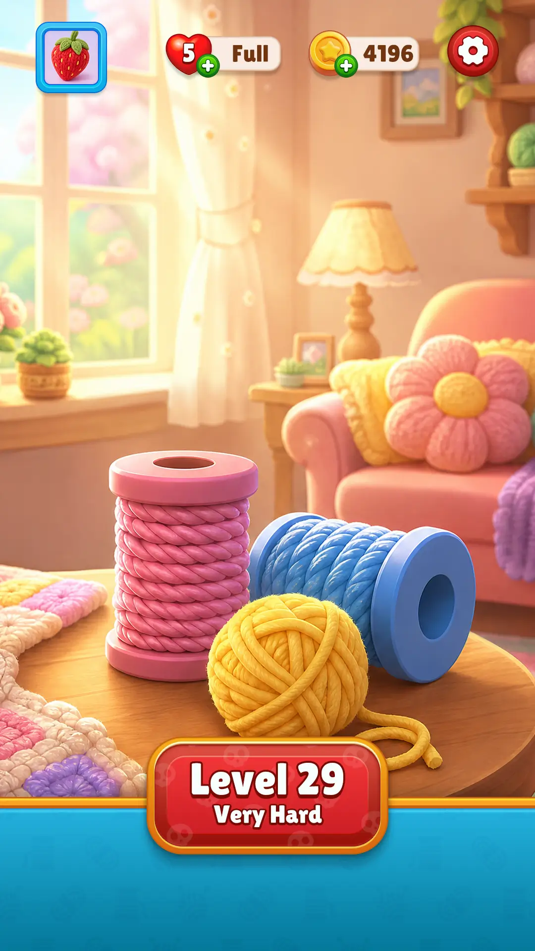 Thread Pop gameplay showing colorful yarn spools in a cozy room